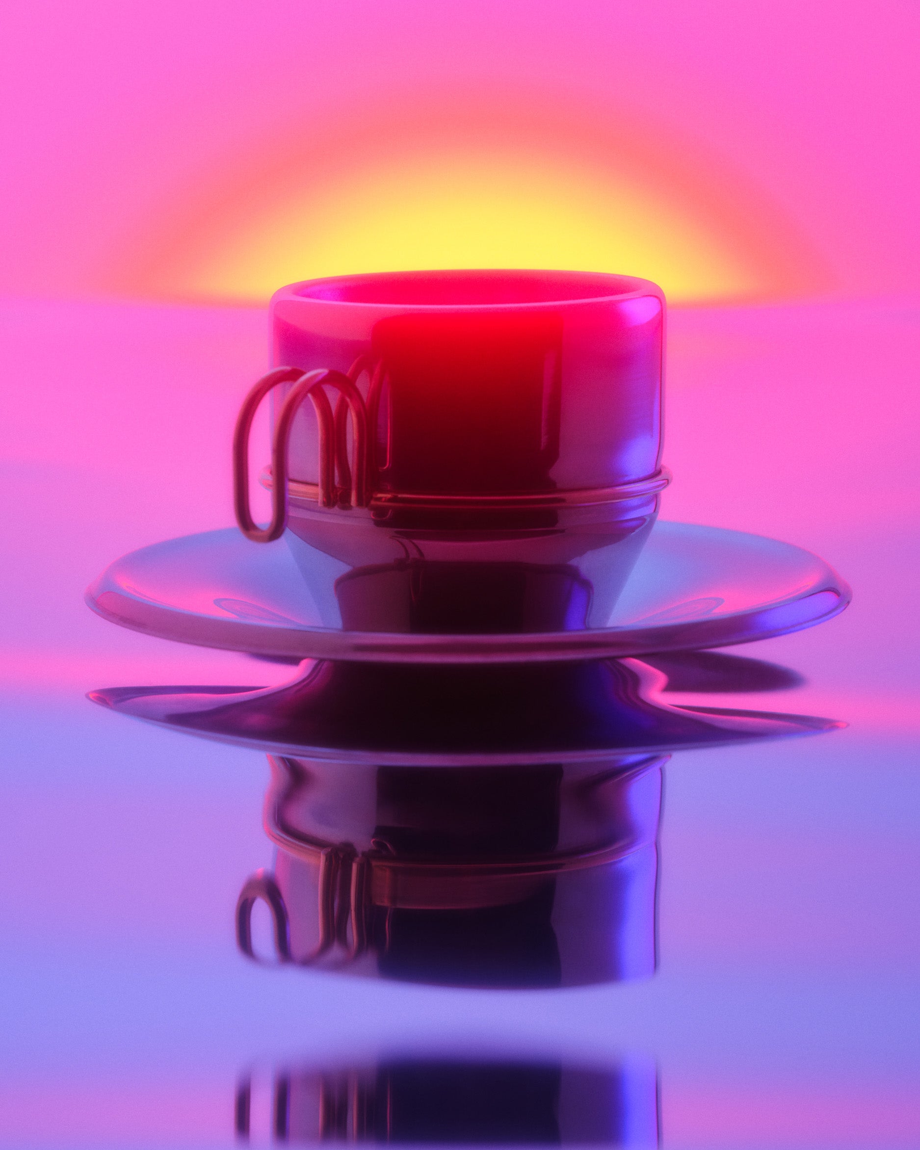 A metal coffee cup with a matching saucer, centered against a vibrant pink and purple background with a glowing yellow-orange light behind it. The cup and saucer are highly reflective, showing strong color reflections and a mirrored reflection below.