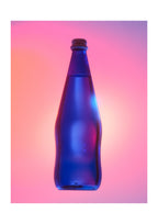 A blue glass water bottle, shown against a vibrant pink and purple gradient background with neon blue and pink lighting.